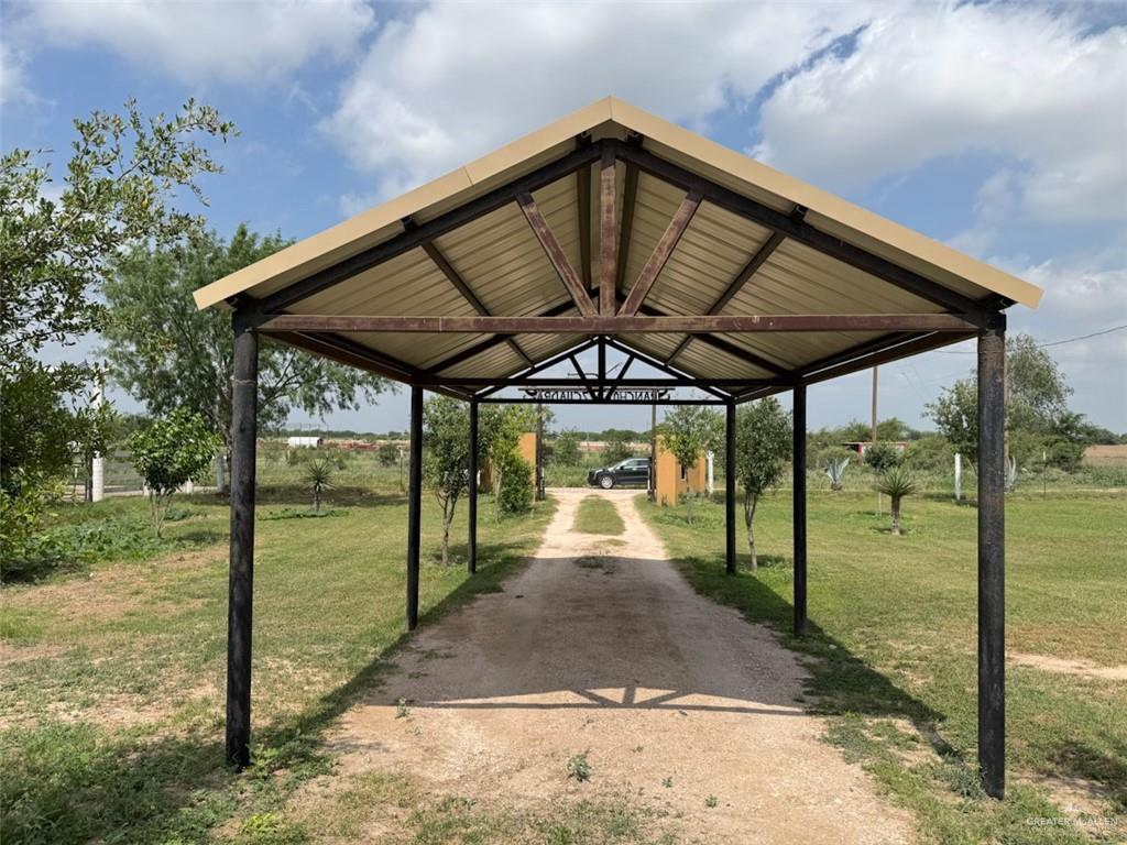 23960 North Texan Road Edinburg, TX 78541 - Photo 4 of 31 a view of a porch