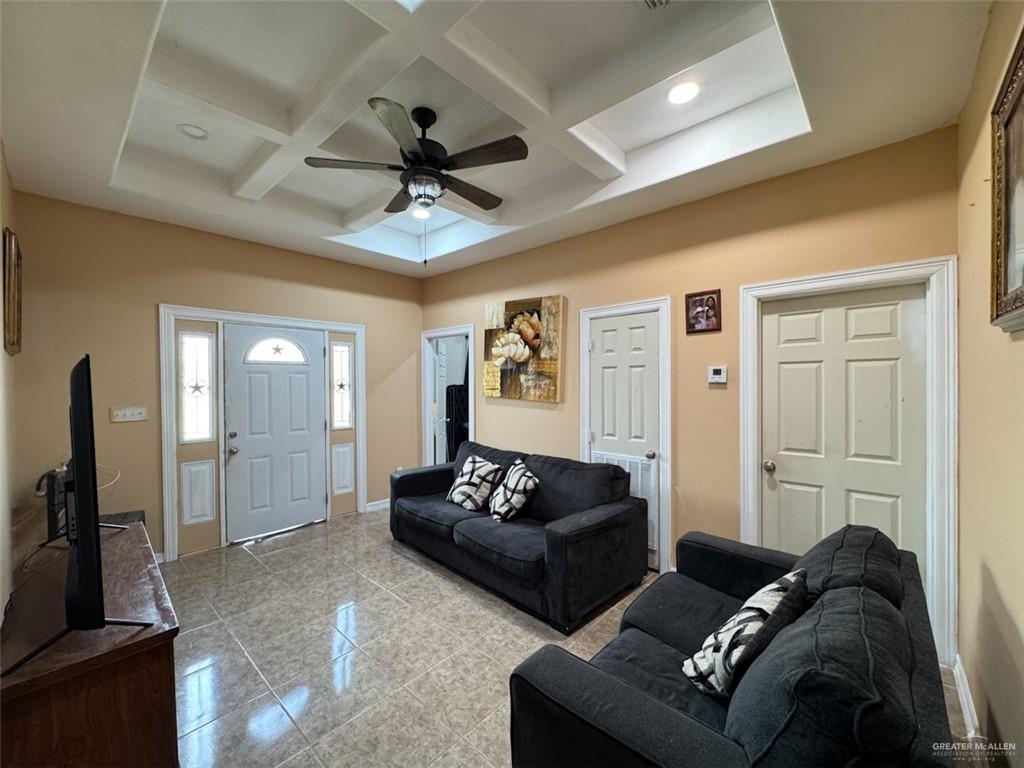 23960 North Texan Road Edinburg, TX 78541 - Photo 6 of 31 a living room with furniture and a flat screen tv