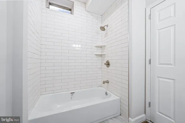 a bathroom with a bathtub