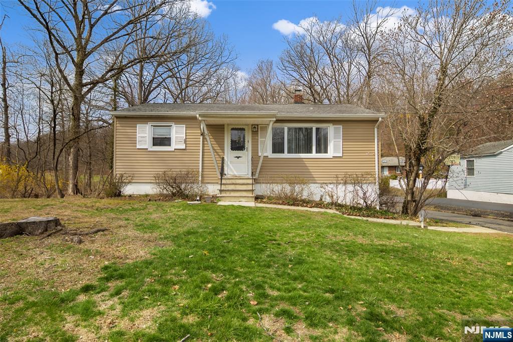 152 Pine Brook Road Lincoln Park, NJ 07035 - Photo 2 of 7 a front view of house with yard and trees