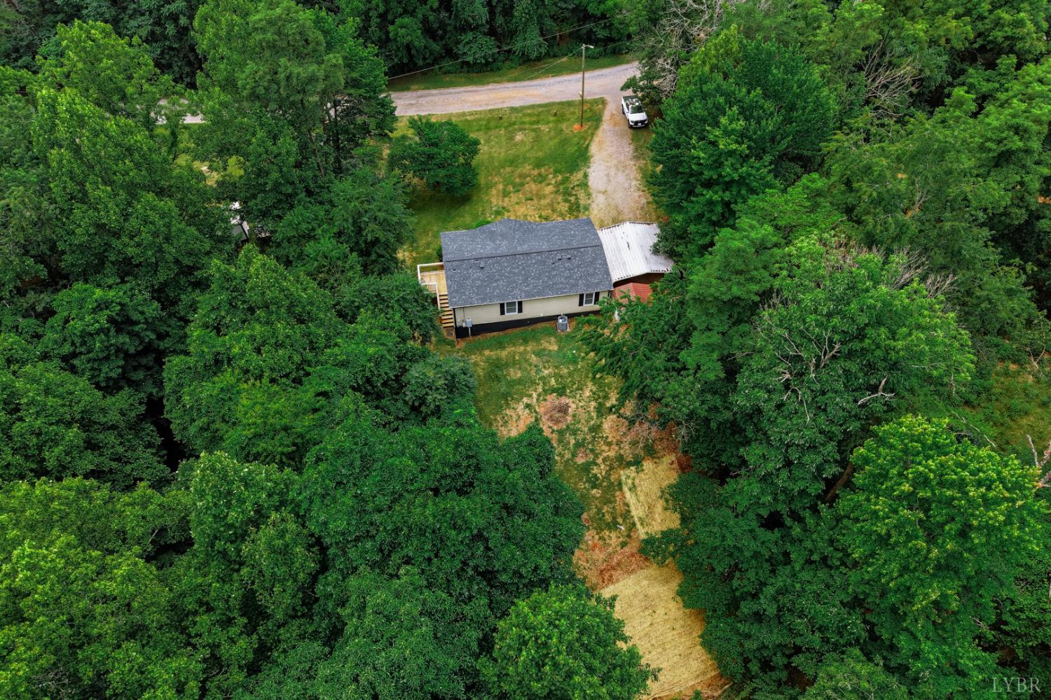 304 Ridgelake Road Goodview, VA 24095 - Photo 29 of 29 an aerial view of a house with a yard