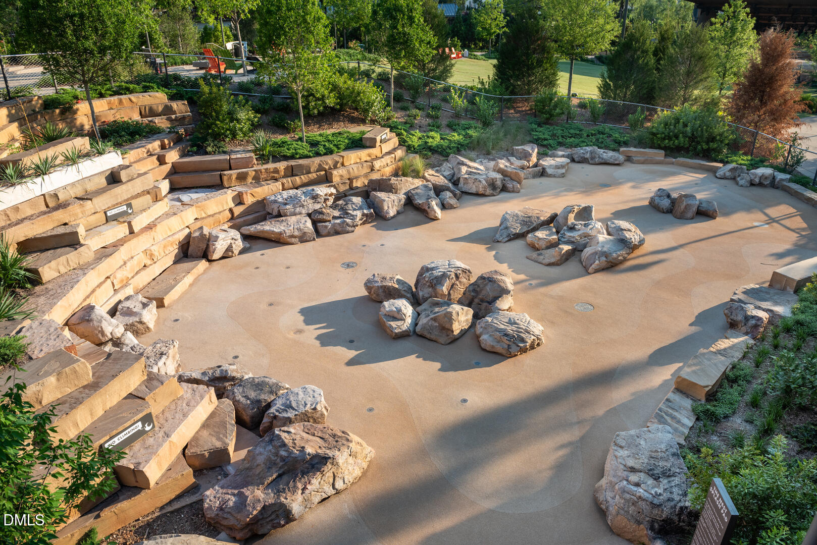 620 Hedrick Ridge Road, Unit 112 Cary, NC 27519 - Photo 21 of 34 a view of a backyard of a house with a patio
