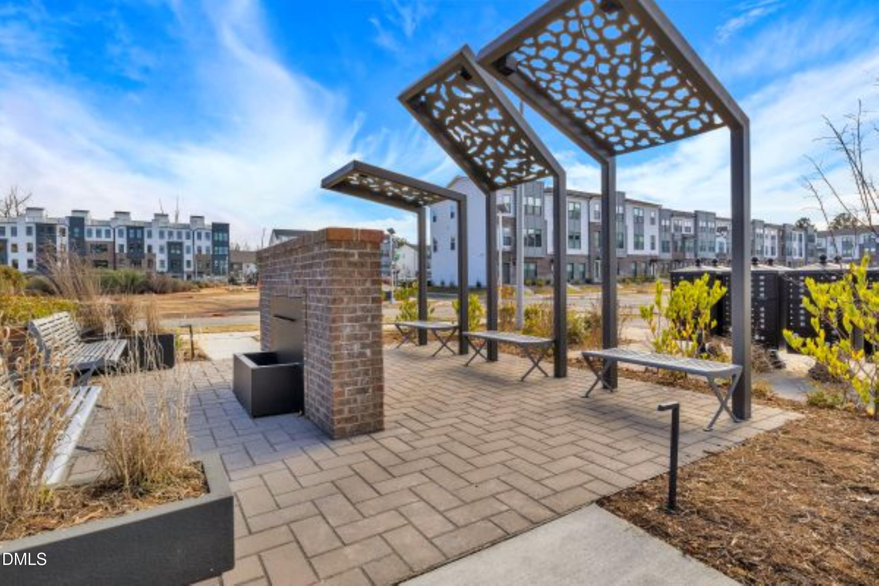 620 Hedrick Ridge Road, Unit 112 Cary, NC 27519 - Photo 34 of 34 a view of a terrace with seating space