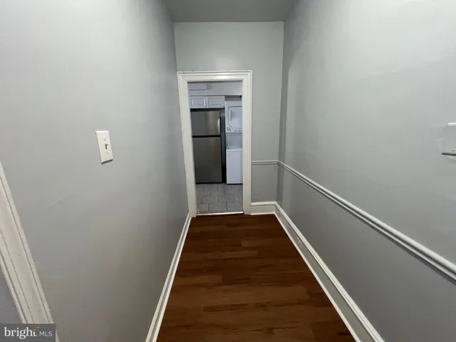 a kitchen with a refrigerator a sink and dishwasher