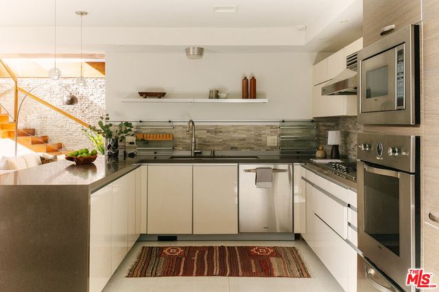 a room with furniture and a window