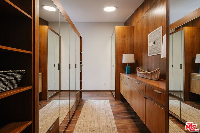 a view of backyard with outdoor seating and green space