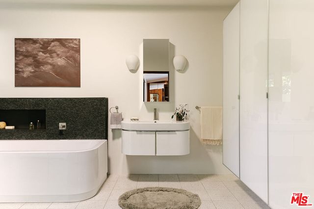 a view of a swimming pool with a yard