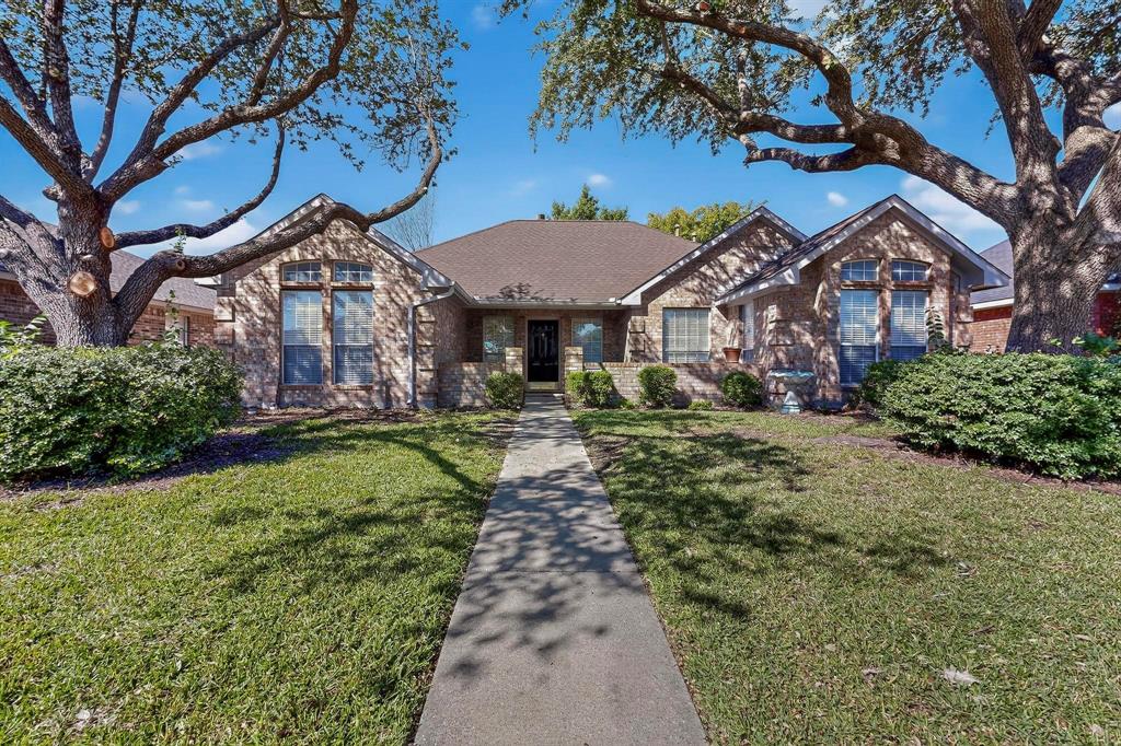 2601 Daisy Lane Rowlett, TX 75089 - Photo 2 of 36 a front view of a house with a yard
