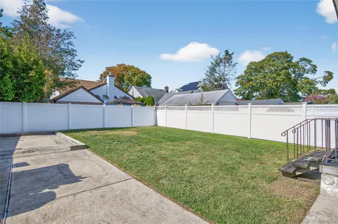 a picture of a bathroom with a shower