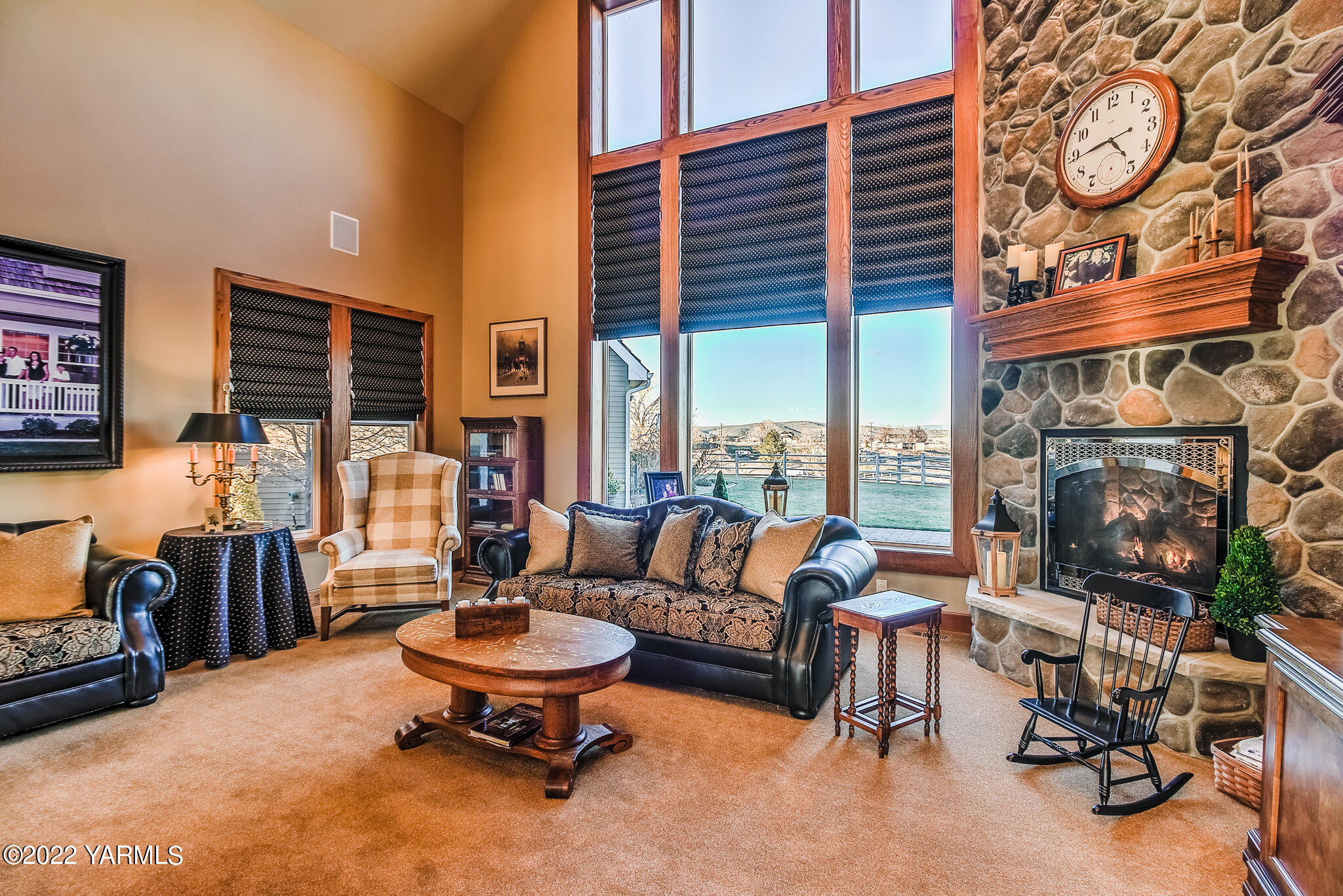 11392 Zier Road Yakima, WA 98908 - Photo 7 of 47 a living room with furniture a fireplace and a large window