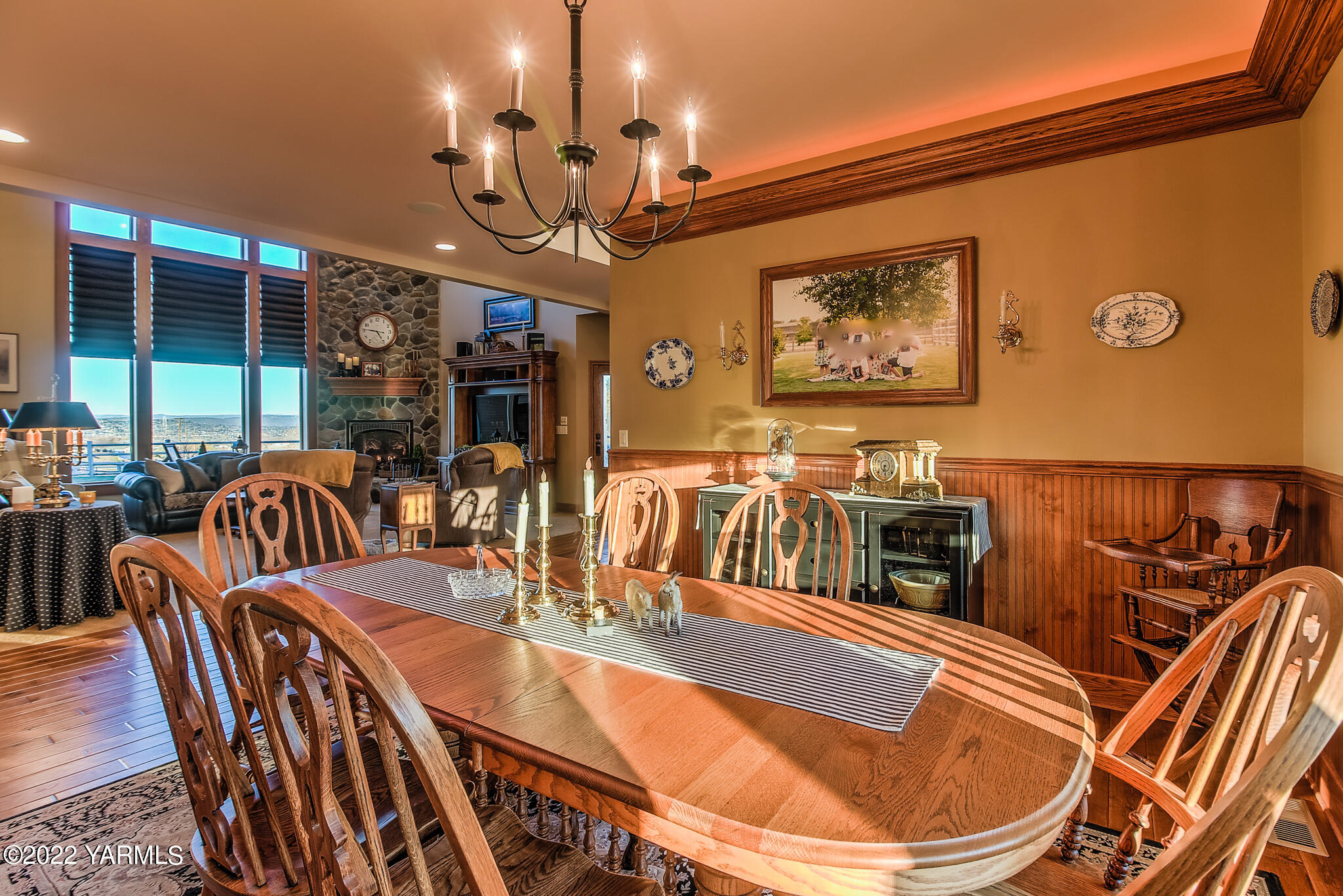 11392 Zier Road Yakima, WA 98908 - Photo 10 of 47 a view of a dining room with furniture wooden floor and chandelier
