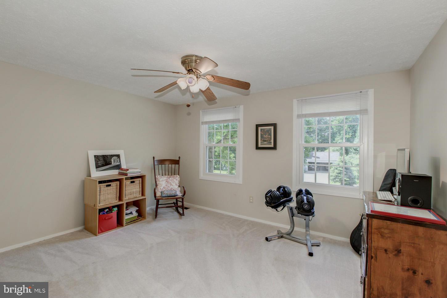 5727 Heming Avenue Springfield, VA 22151 - Photo 22 of 30 a view of a workspace with furniture and a window