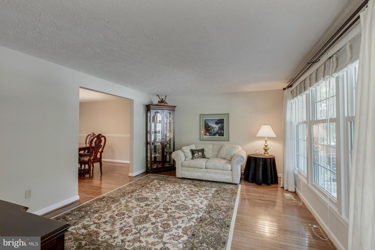 5727 Heming Avenue Springfield, VA 22151 - Photo 8 of 30 a living room with furniture and a large window