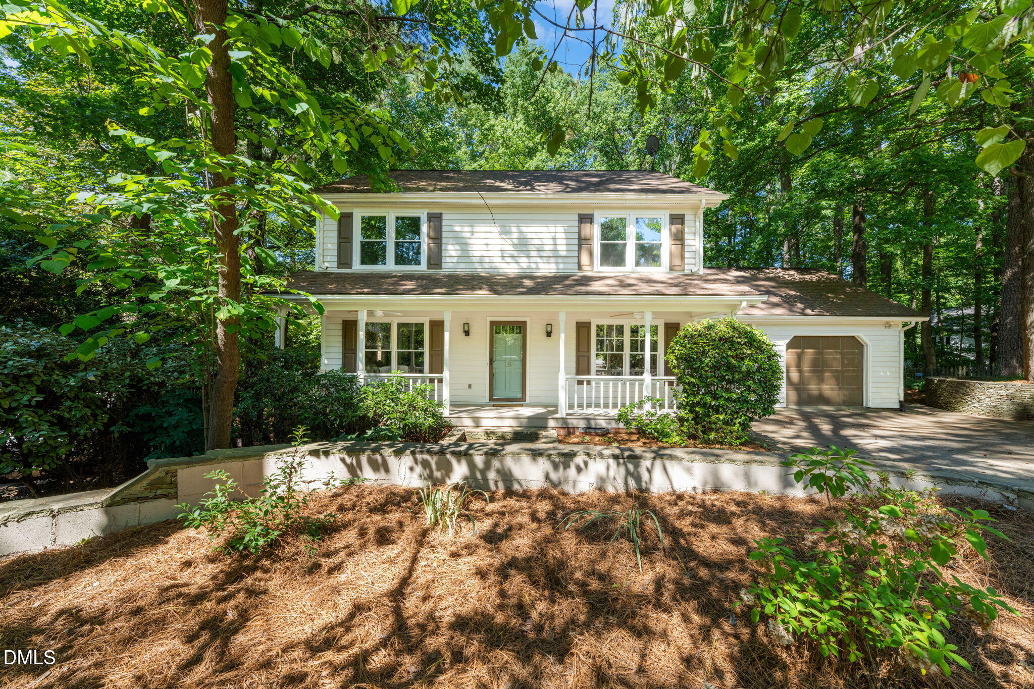 18 Strawberry Ridge Lane Durham, NC 27713 - Photo 1 of 59 a front view of a house with a yard
