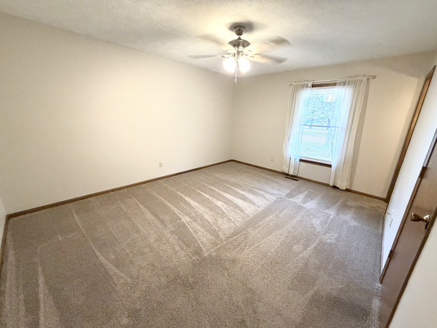 1867 Gragg Street Centralia, IL 62801 - Photo 11 of 30 an empty room with windows and fan