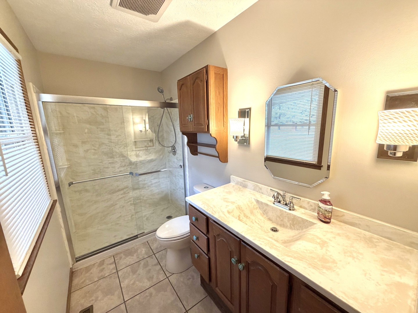 1867 Gragg Street Centralia, IL 62801 - Photo 13 of 30 a bathroom with a granite countertop sink mirror vanity and toilet