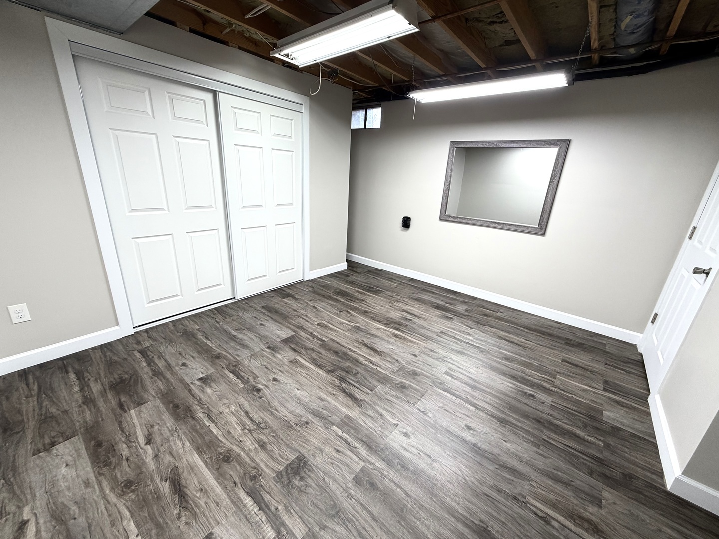 1867 Gragg Street Centralia, IL 62801 - Photo 25 of 30 an empty room with wooden floor and windows