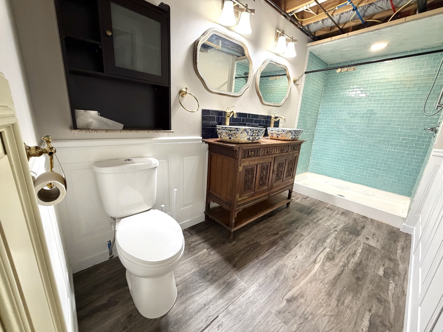 1867 Gragg Street Centralia, IL 62801 - Photo 27 of 30 a bathroom with a toilet a sink and a mirror