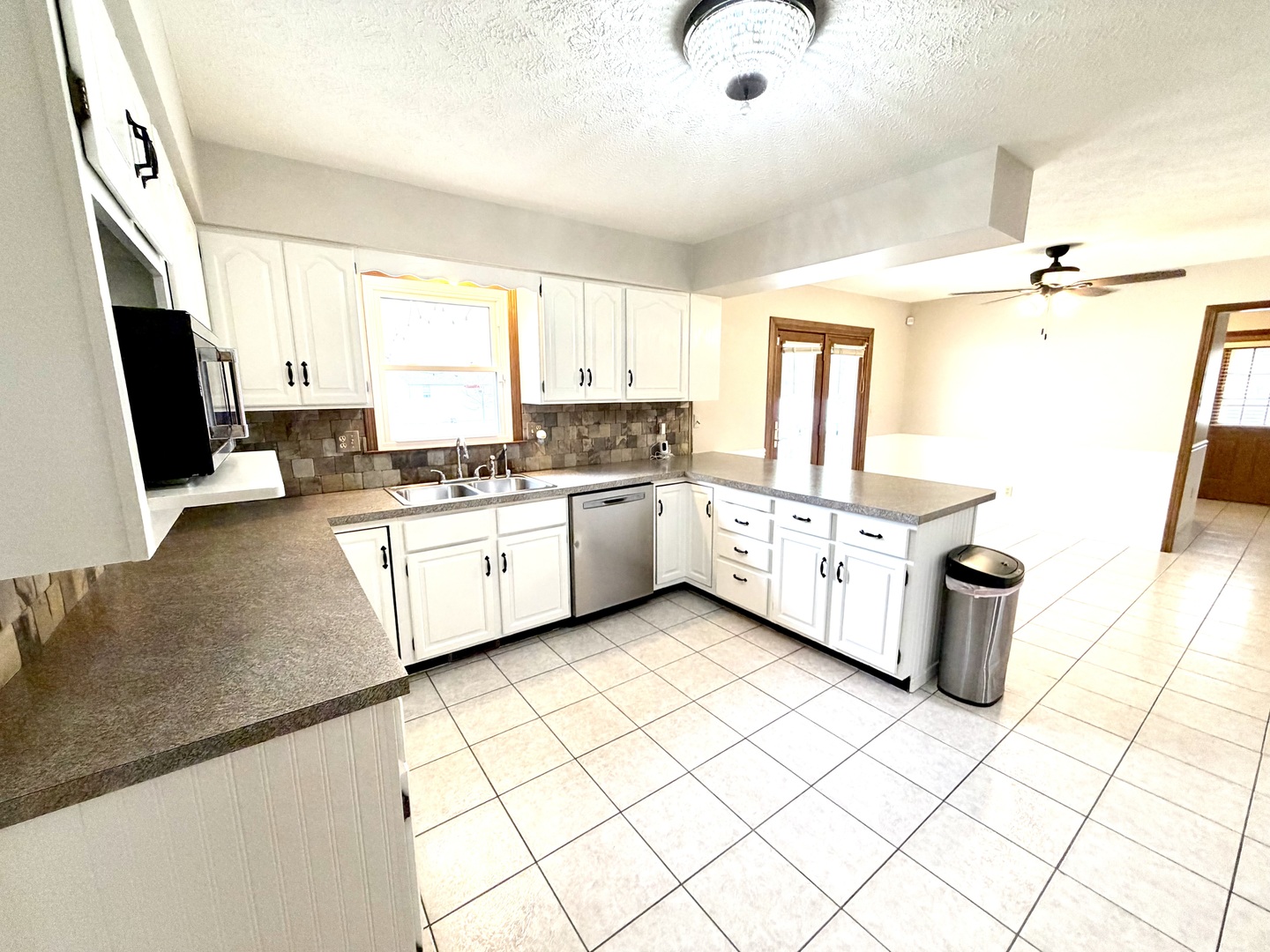 1867 Gragg Street Centralia, IL 62801 - Photo 8 of 30 a kitchen with a sink and a stove top oven