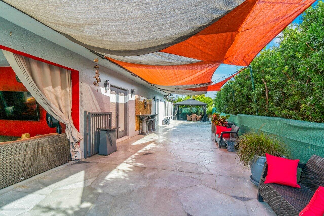 294 Northwest 69th Street Boca Raton, FL 33487 - Photo 33 of 39 a view of outdoor space yard deck and patio