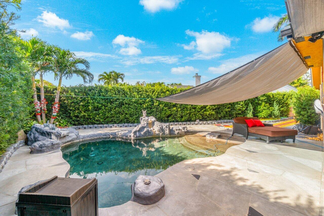 294 Northwest 69th Street Boca Raton, FL 33487 - Photo 38 of 39 a view of a backyard