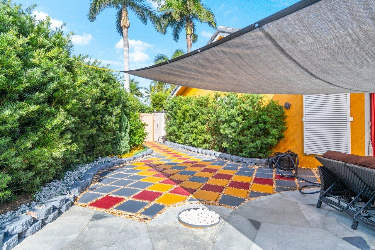 294 Northwest 69th Street Boca Raton, FL 33487 - Photo 39 of 39 a backyard of a house with seating space