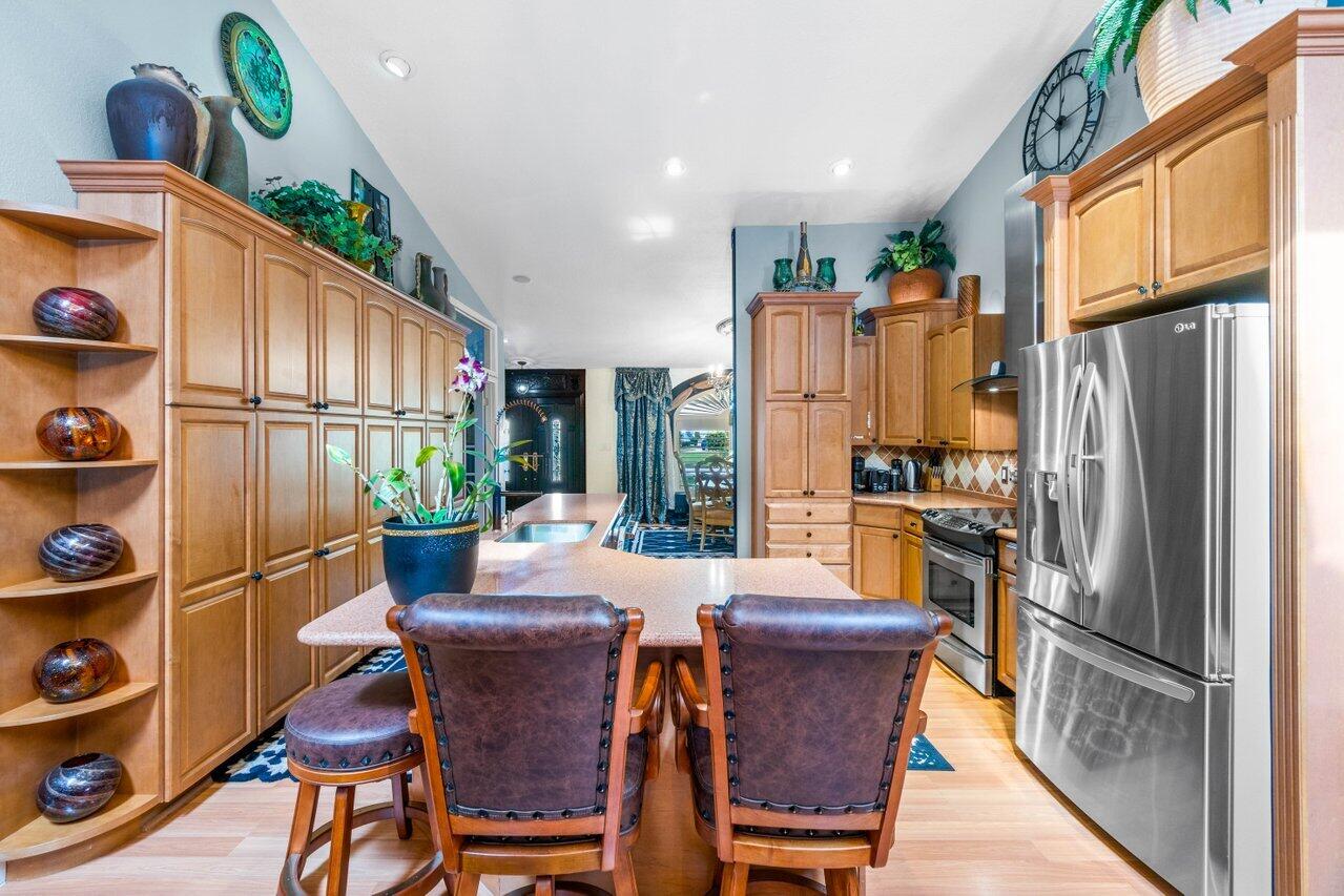 294 Northwest 69th Street Boca Raton, FL 33487 - Photo 8 of 39 a view of a dining room with furniture window and outside view