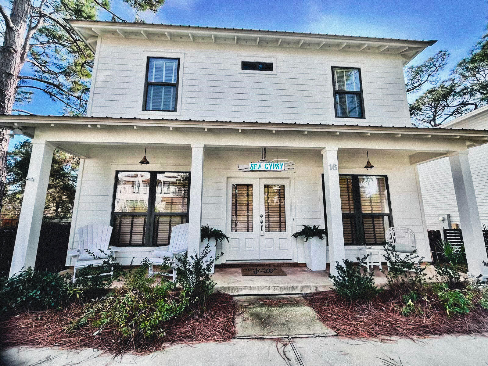 16 Kingfish Street Santa Rosa Beach, FL 32459 - Photo 4 of 21 a front view of a house with a yard
