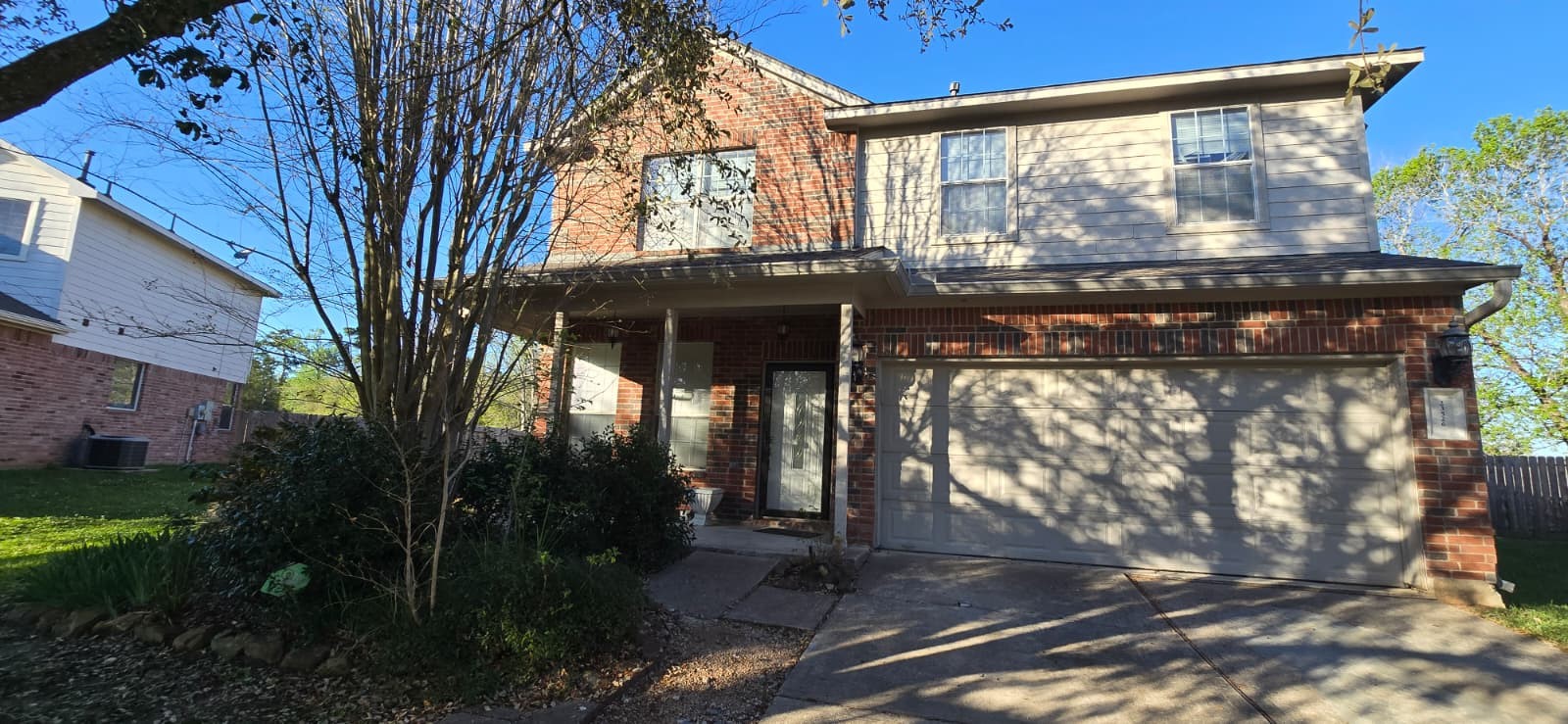 23526 Whispering Maple Drive Spring, TX 77373 - Photo 5 of 23 a view of a house with a tree