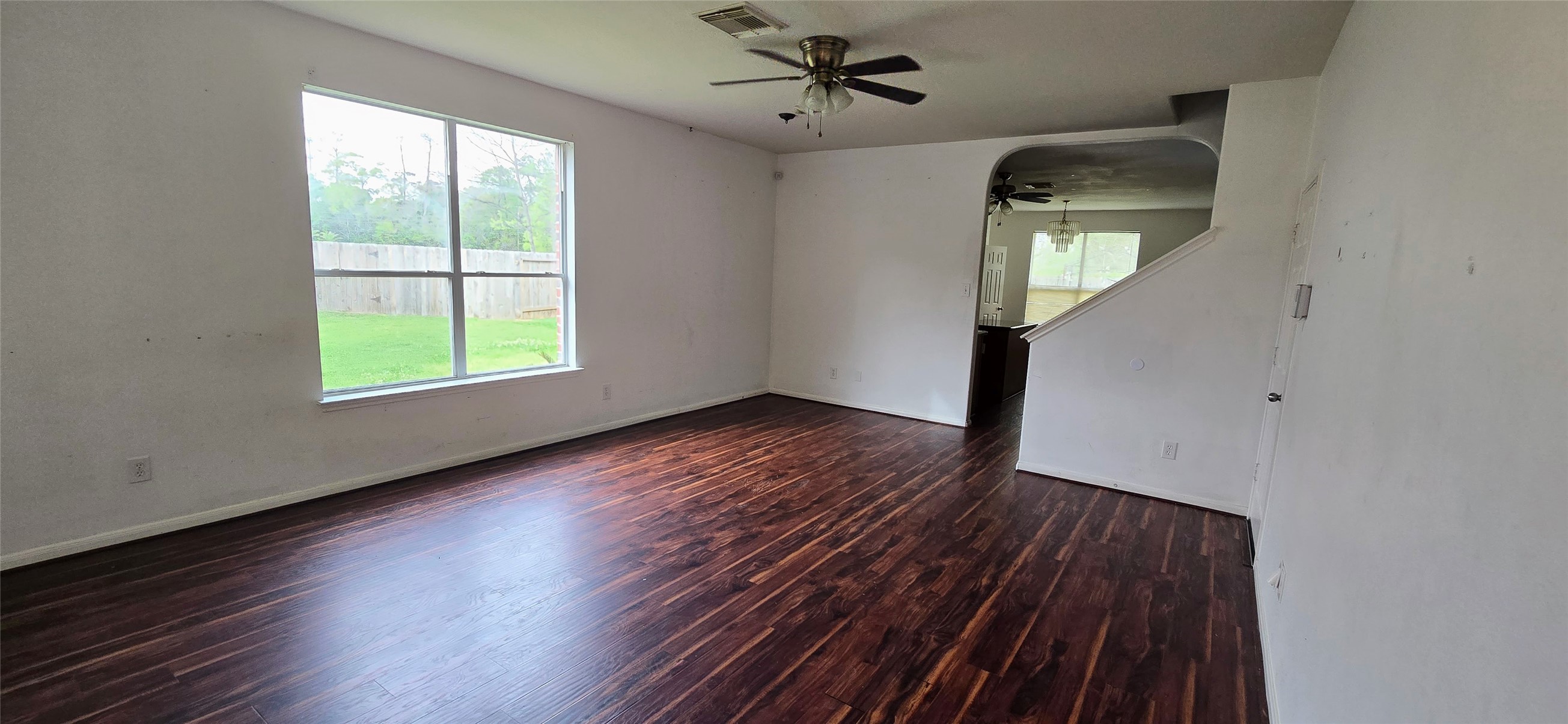 23526 Whispering Maple Drive Spring, TX 77373 - Photo 7 of 23 wooden floor in an empty room with a window