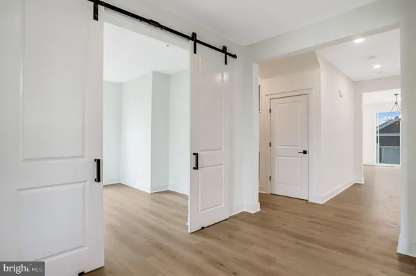 a view of entryway with wooden floor