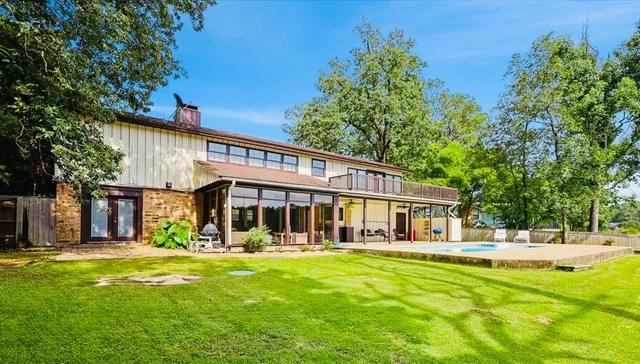 a view of a house with a swimming pool