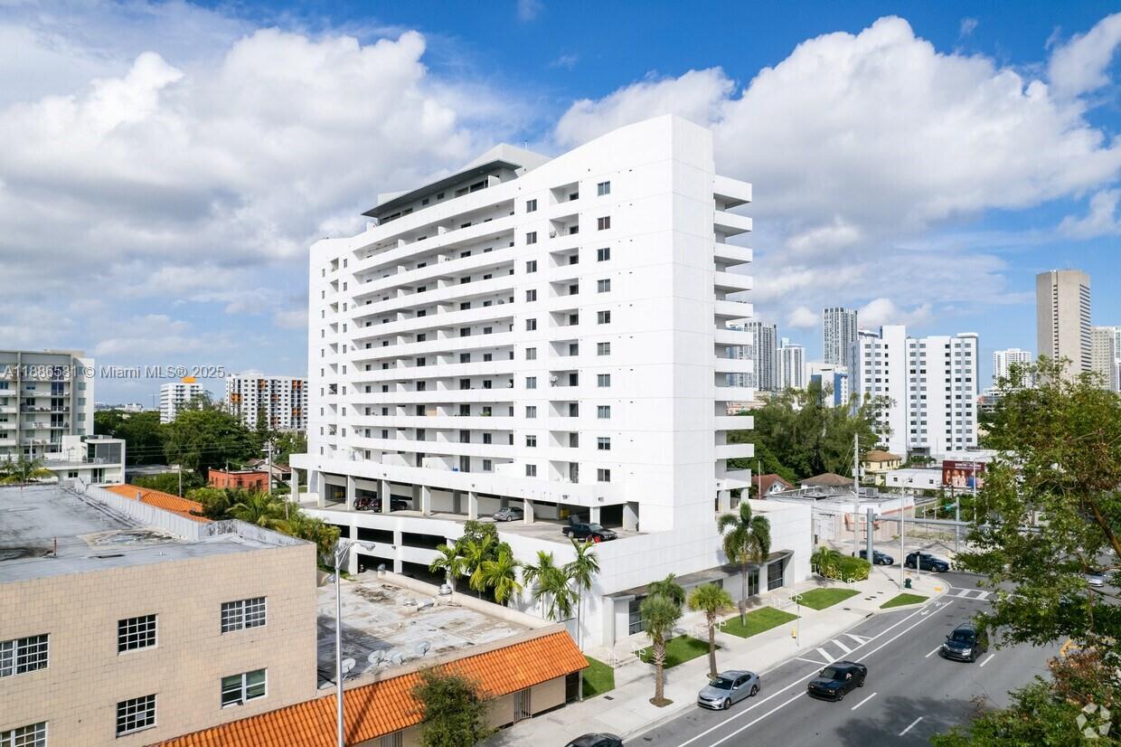 36 Northwest 6th Avenue, Unit TS9 Miami, FL 33128 - Photo 1 of 50 a city view with tall buildings