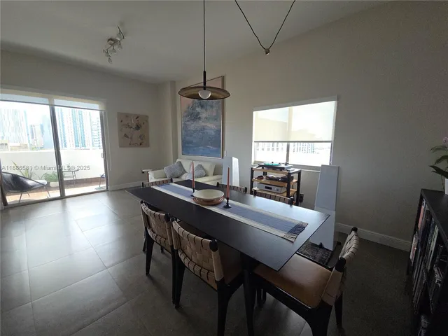 a bedroom with a workspace