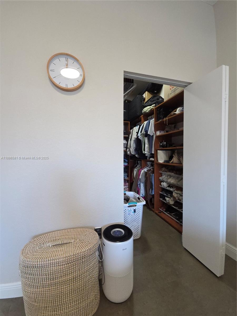 36 Northwest 6th Avenue, Unit TS9 Miami, FL 33128 - Photo 32 of 50 a room with a book shelf