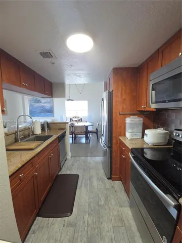 a bedroom with bed and a window