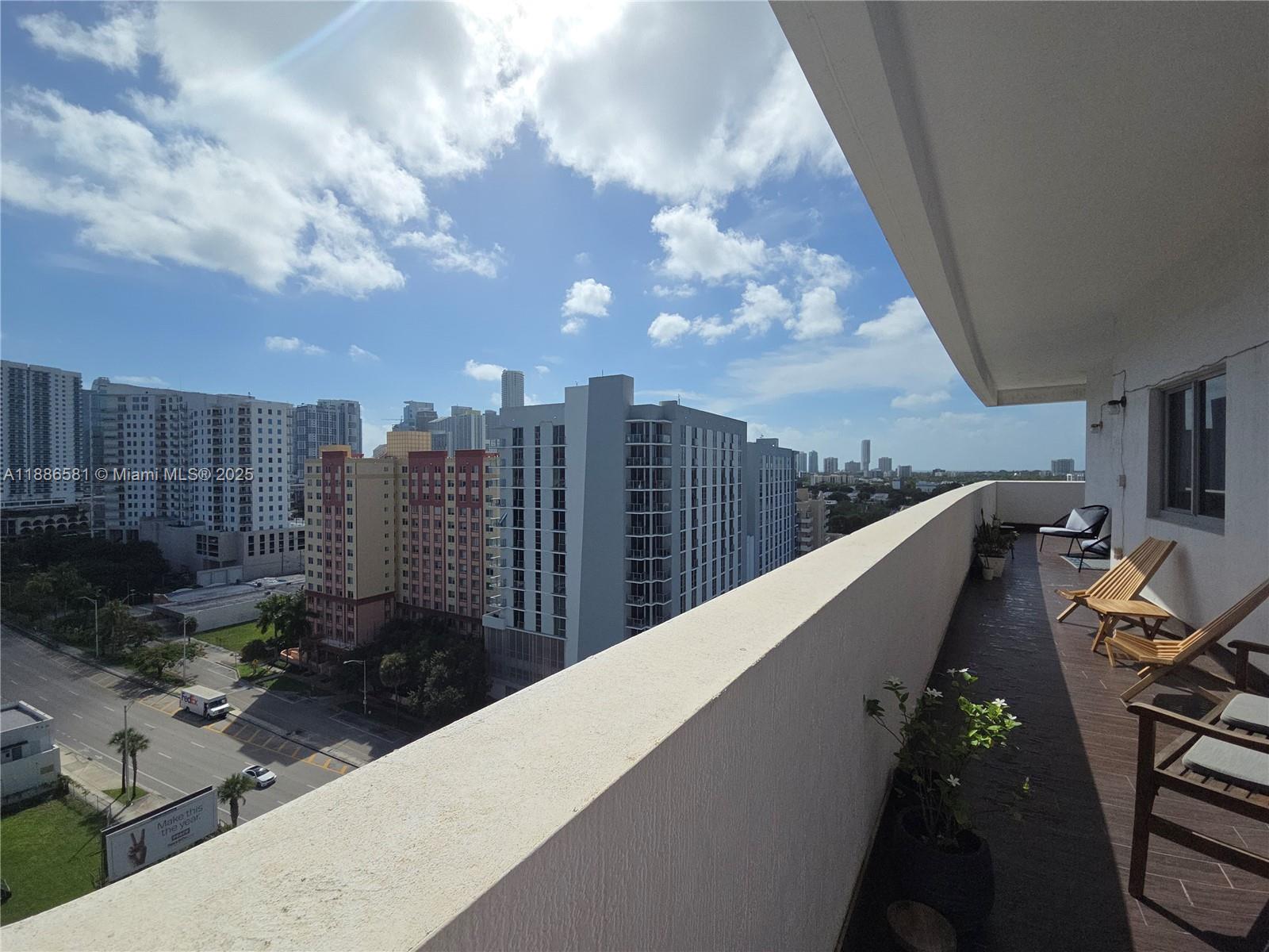 36 Northwest 6th Avenue, Unit TS9 Miami, FL 33128 - Photo 6 of 50 a view of balcony with furniture