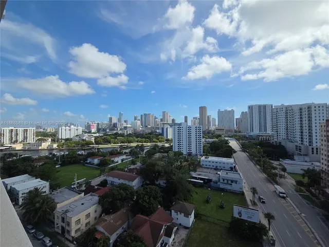 a view of a city with tall buildings