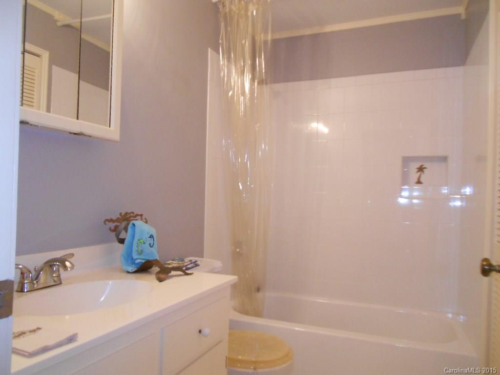 383 East Rebound Road Lancaster, SC 29720 - Photo 11 of 22 a bathroom with a sink and a shower