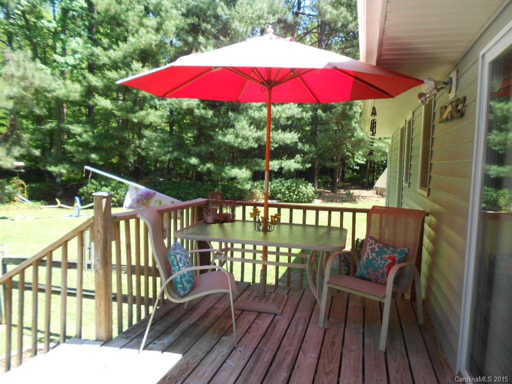 383 East Rebound Road Lancaster, SC 29720 - Photo 22 of 22 a view of a balcony with wooden floor and outdoor seating