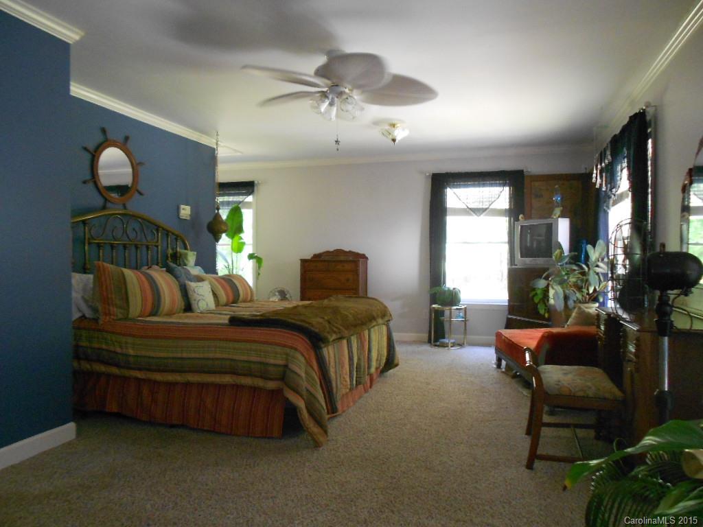 383 East Rebound Road Lancaster, SC 29720 - Photo 7 of 22 a spacious bedroom with a bed and window