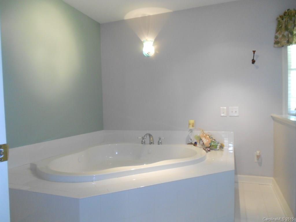 383 East Rebound Road Lancaster, SC 29720 - Photo 9 of 22 a bathroom with a bathtub