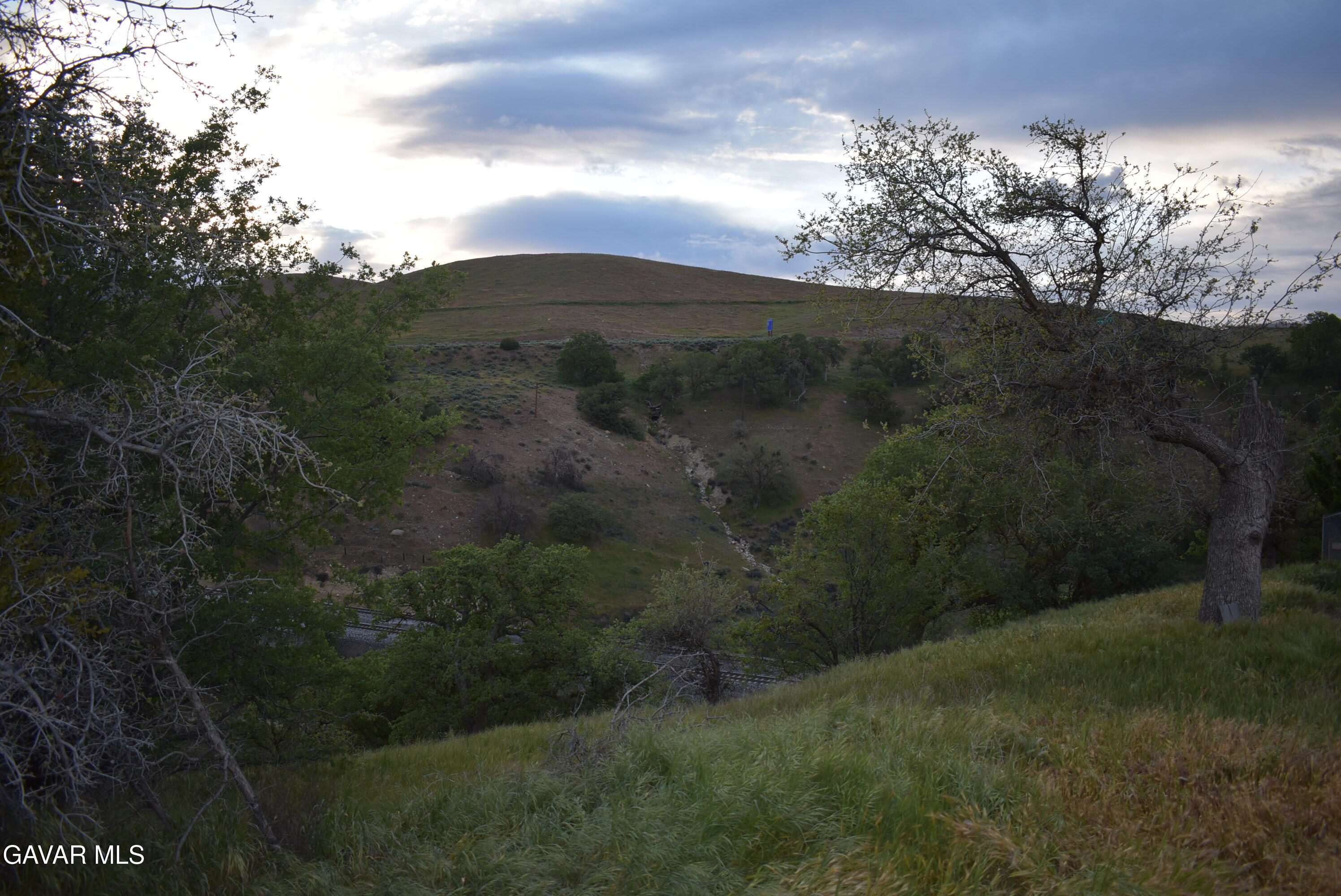 19300 Moon Drive Tehachapi, CA 93561 - Photo 12 of 13 a view of a yard with an outdoor space