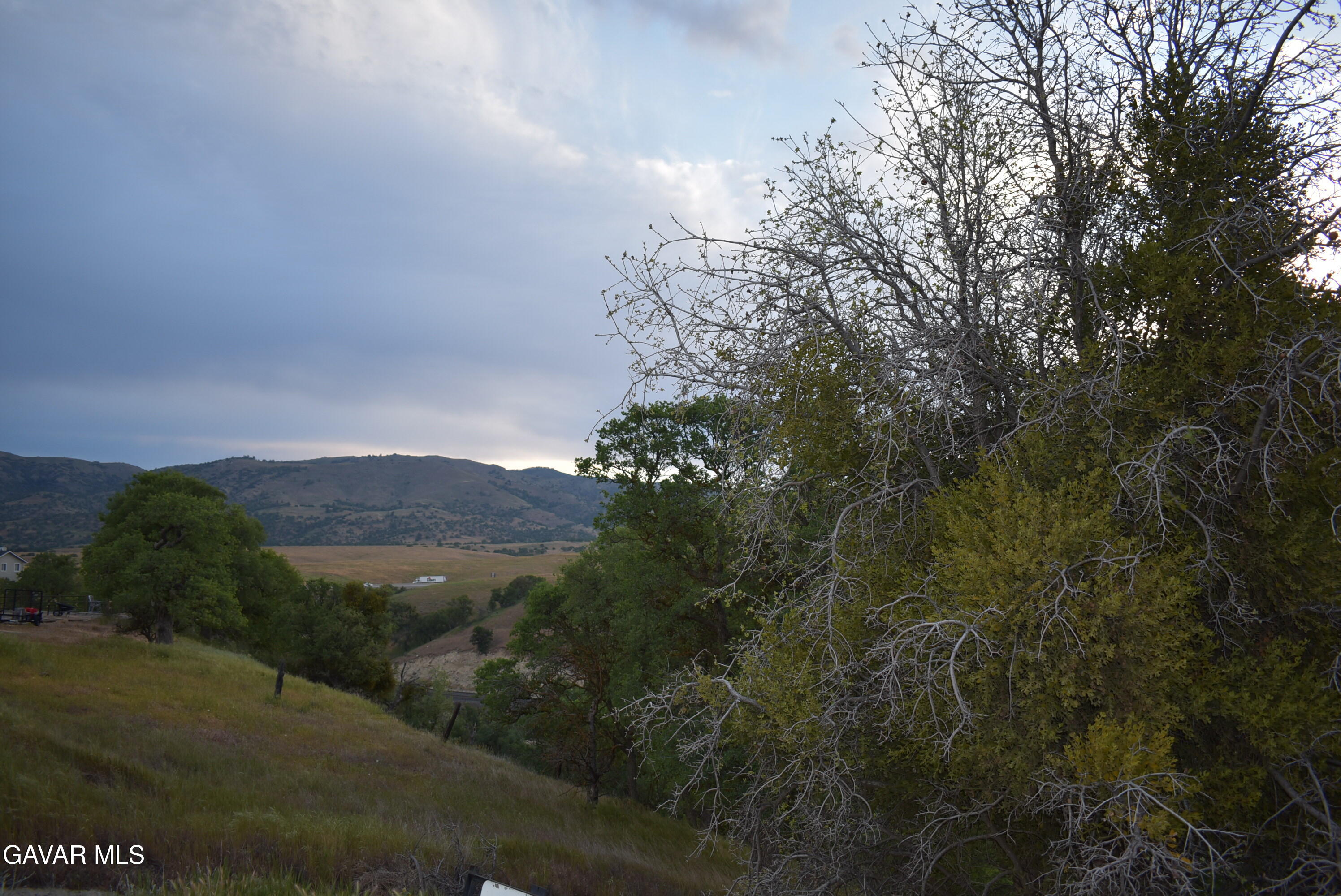 19300 Moon Drive Tehachapi, CA 93561 - Photo 13 of 13 a view of a house with a mountain in the background