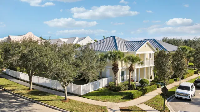 a view of houses with yard