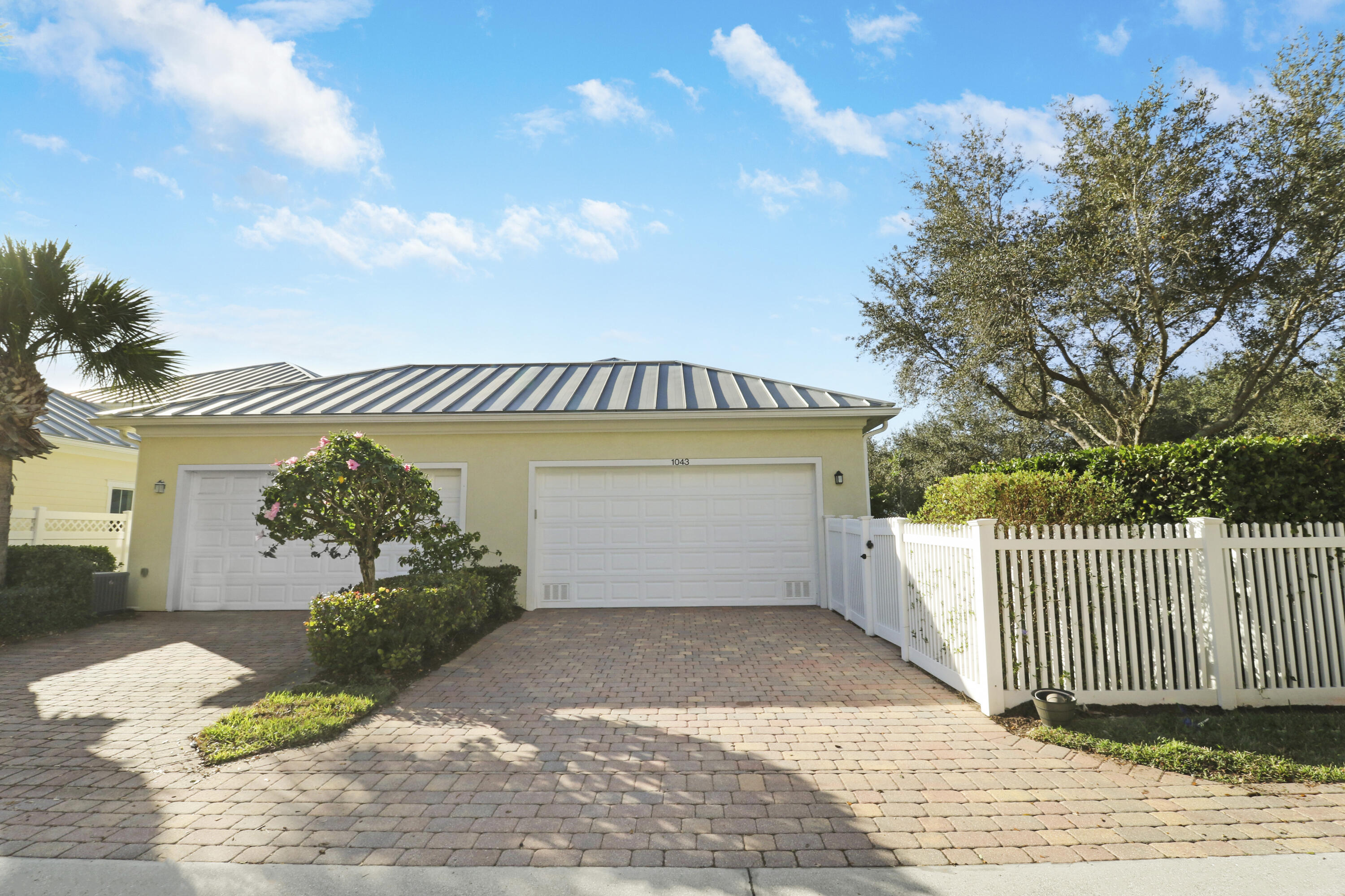 1043 Key Largo Street Jupiter, FL 33458 - Photo 40 of 46 2 Car Garage and Driveway