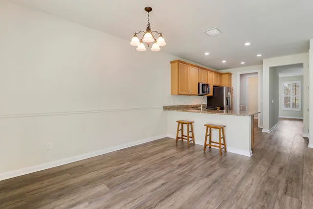 a view of a kitchen with breakfast area
