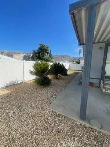 a view of a house with a patio