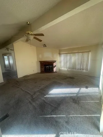 a living room with a fireplace