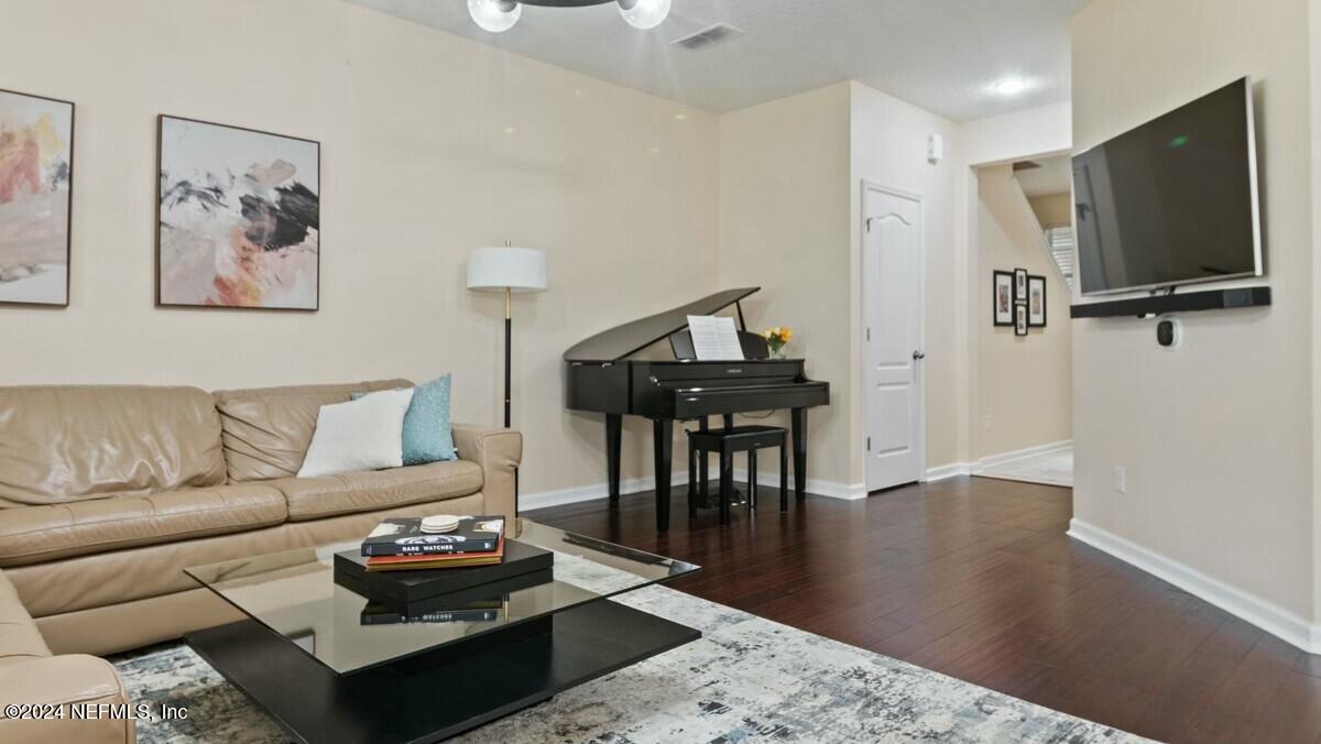 3842 Chasing Falls Road Orange Park, FL 32065 - Photo 15 of 33 Family room view towards Foyer
